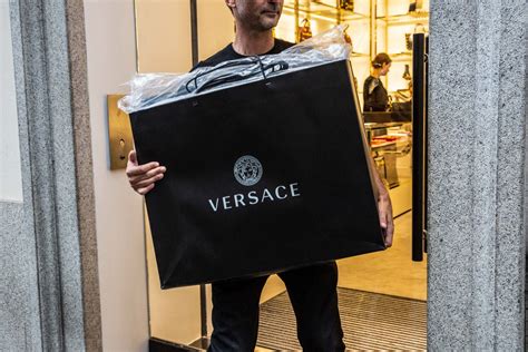 kors e versace m&a report|michael kors buys versace.